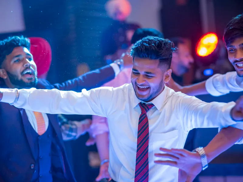 Students dancing together at a college night.